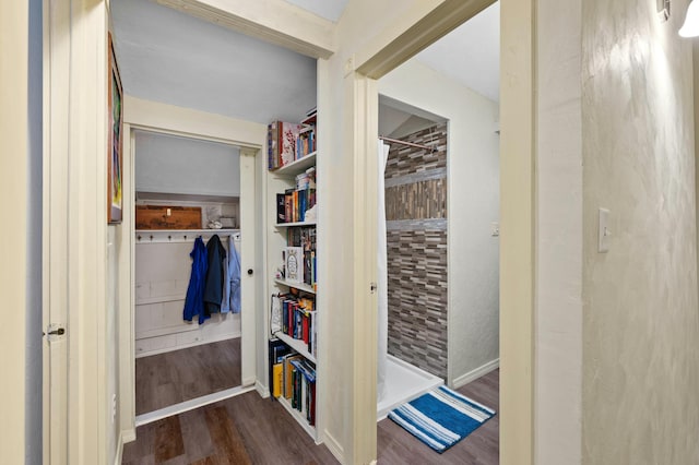 spacious closet with wood finished floors