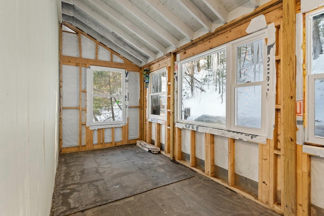 unfurnished sunroom with vaulted ceiling