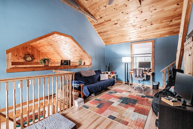 bedroom with lofted ceiling, wood ceiling, and light hardwood / wood-style floors