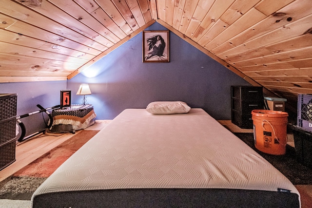 bedroom featuring wood ceiling and vaulted ceiling