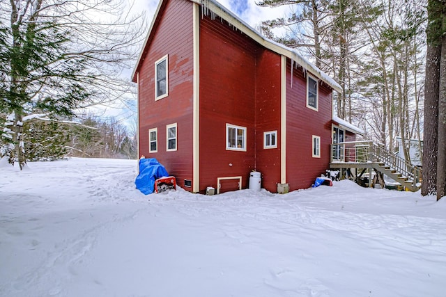 view of snow covered property