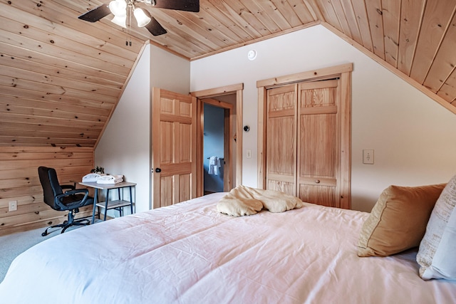 carpeted bedroom featuring wood walls, wood ceiling, vaulted ceiling, a closet, and ceiling fan