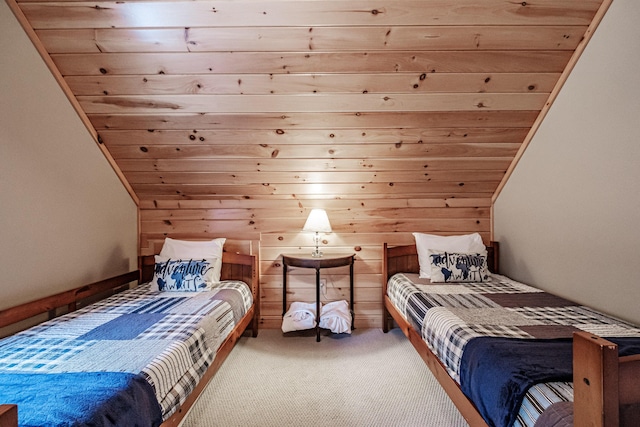 bedroom with vaulted ceiling and carpet