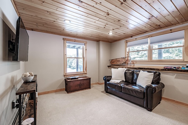 sitting room featuring light carpet and wooden ceiling