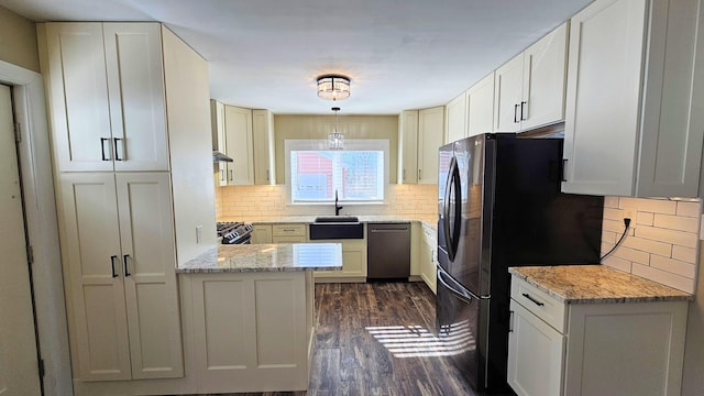 kitchen with range, dishwasher, dark wood-style floors, hanging light fixtures, and light stone countertops