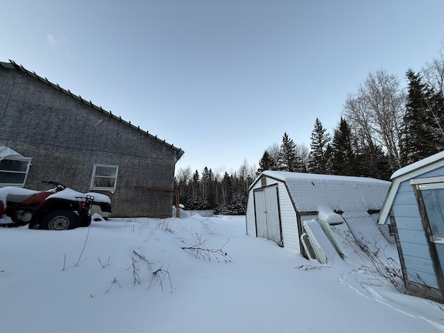 view of yard layered in snow