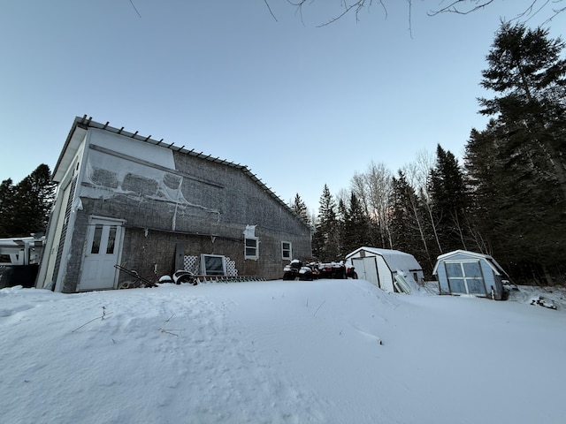 exterior space with a storage shed