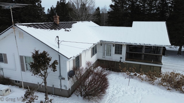 view of snow covered exterior