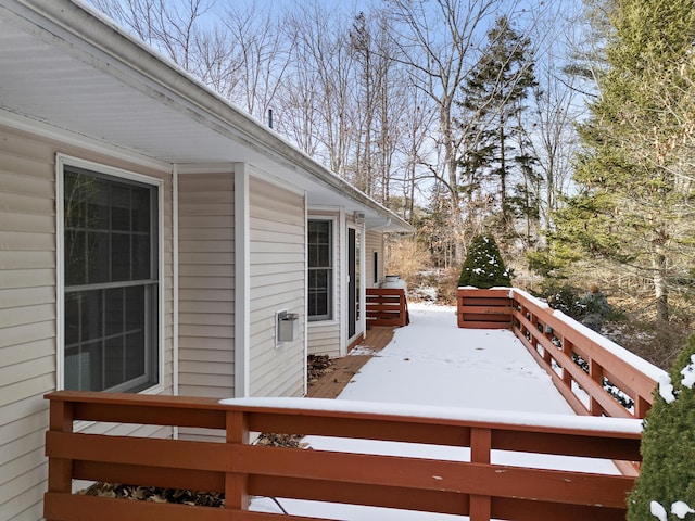 view of snow covered deck