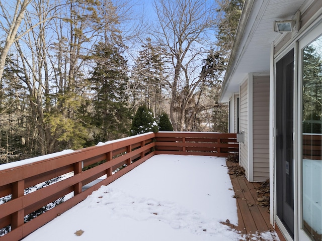 view of snow covered deck