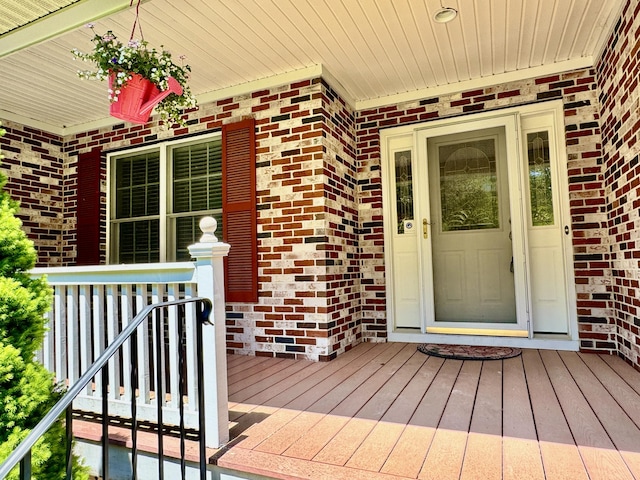 18 Patricia Ln, Saint George, ME 04859 - doorway to property with brick siding and a porch