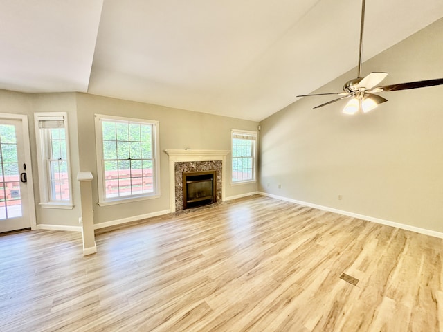 18 Patricia Ln, Saint George, ME 04859 - unfurnished living room with healthy amount of natural light, light wood finished floors, baseboards, and lofted ceiling