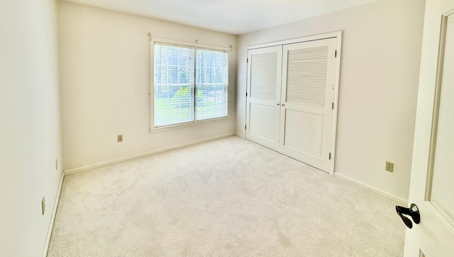 18 Patricia Ln, Saint George, ME 04859 - unfurnished bedroom with carpet floors, baseboards, and a closet