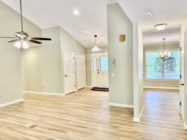 18 Patricia Ln, Saint George, ME 04859 - foyer featuring light wood finished floors, healthy amount of natural light, baseboards, and high vaulted ceiling