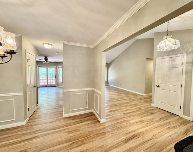 18 Patricia Ln, Saint George, ME 04859 - foyer featuring a chandelier, light wood-style flooring, a ceiling fan, baseboards, and ornamental molding