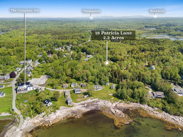 18 Patricia Ln, Saint George, ME 04859 - aerial overview of property's location with a forest