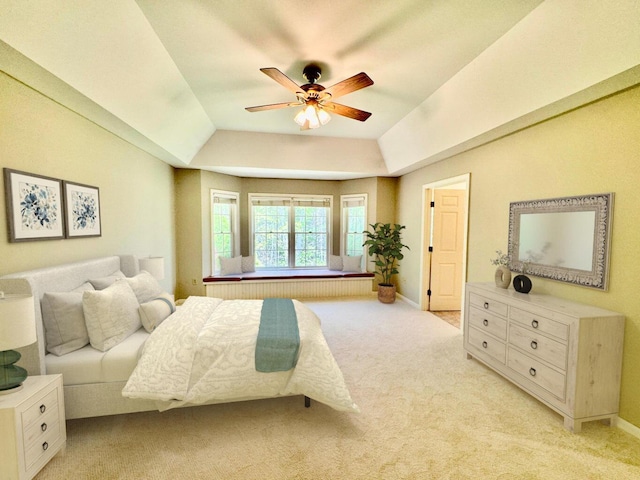 18 Patricia Ln, Saint George, ME 04859 - bedroom with light carpet, a ceiling fan, lofted ceiling, and a raised ceiling