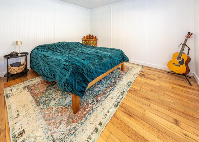 bedroom featuring hardwood / wood-style flooring