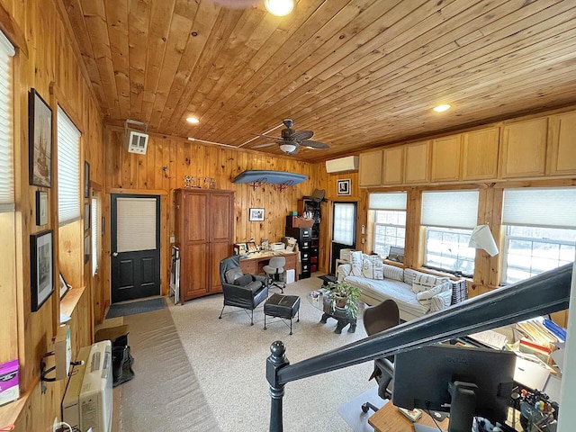 living room featuring wooden walls, light colored carpet, wooden ceiling, and a wall unit AC