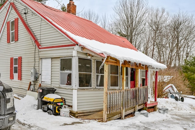 view of snow covered property