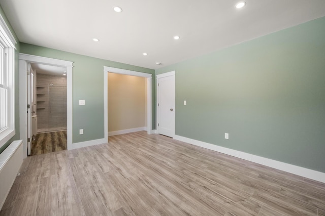 unfurnished bedroom featuring light hardwood / wood-style floors