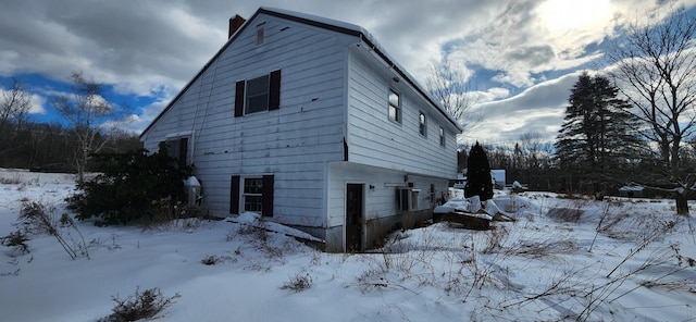 view of snow covered property