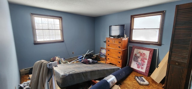 bedroom featuring a textured ceiling