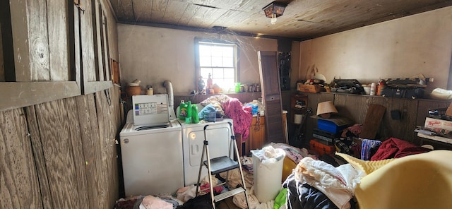 interior space with wood ceiling and washer and dryer