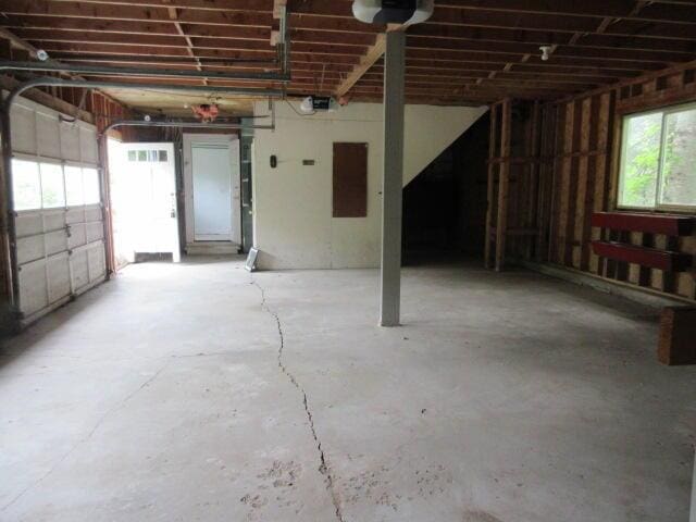 236 Frenchs Mill Rd, Sangerville, ME 04479 - garage featuring a garage door opener