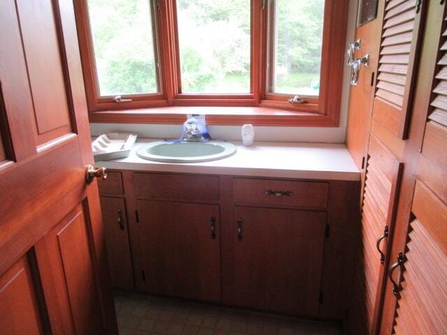 236 Frenchs Mill Rd, Sangerville, ME 04479 - bathroom featuring vanity