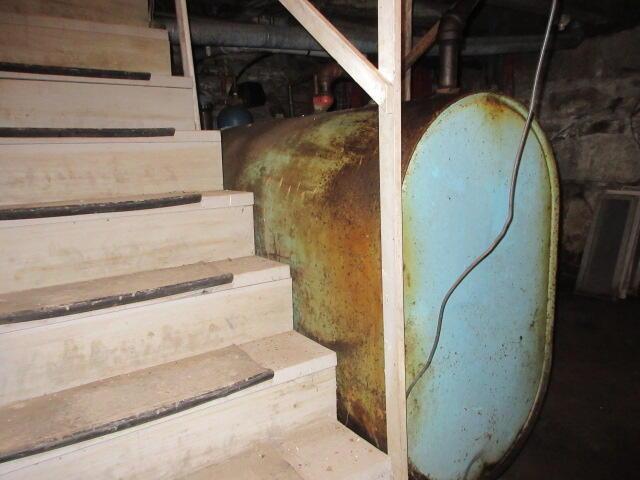 236 Frenchs Mill Rd, Sangerville, ME 04479 - staircase featuring heating fuel