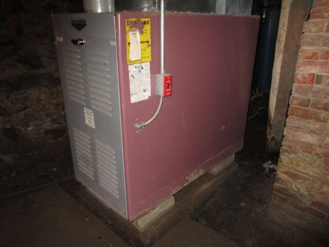 236 Frenchs Mill Rd, Sangerville, ME 04479 - utility room featuring heating unit