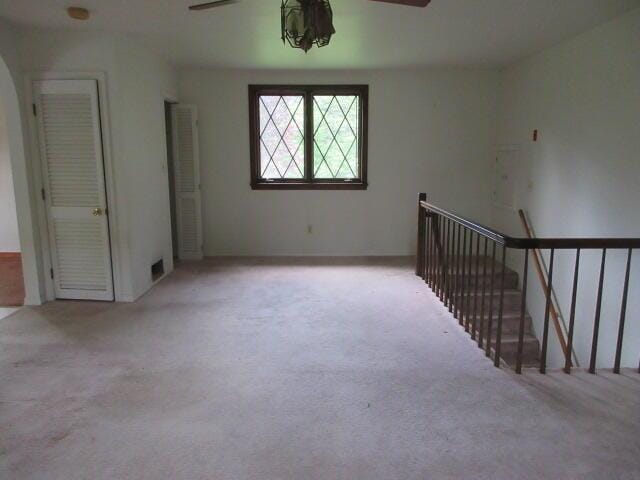 236 Frenchs Mill Rd, Sangerville, ME 04479 - empty room with a ceiling fan and carpet floors