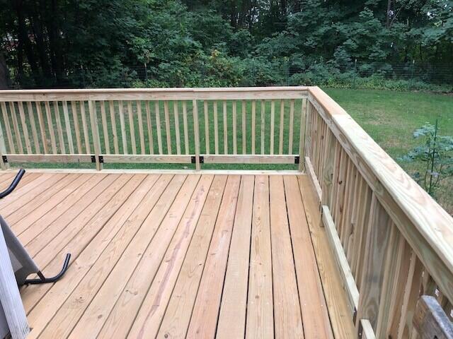 deck with a lawn