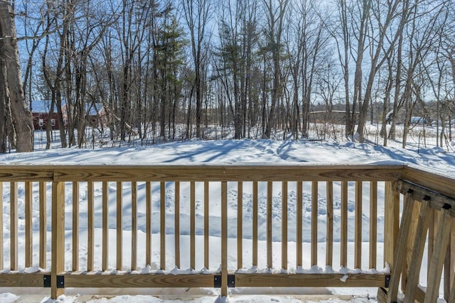 view of snow covered deck