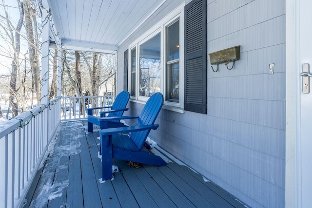 view of snow covered deck