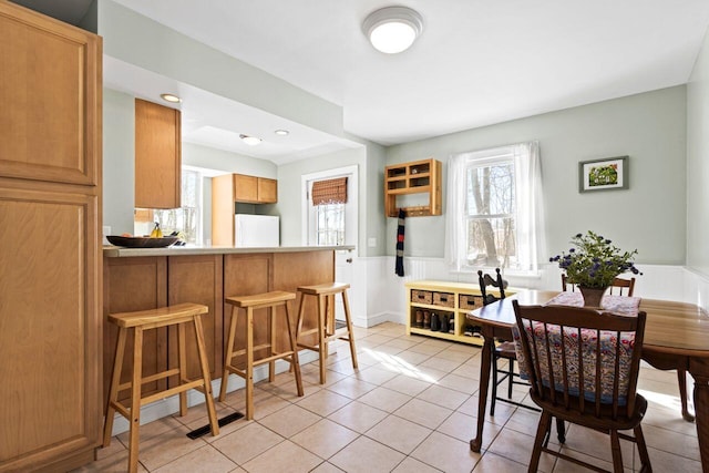 view of tiled dining space