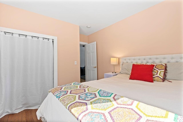 bedroom featuring hardwood / wood-style floors