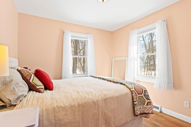 bedroom featuring hardwood / wood-style floors