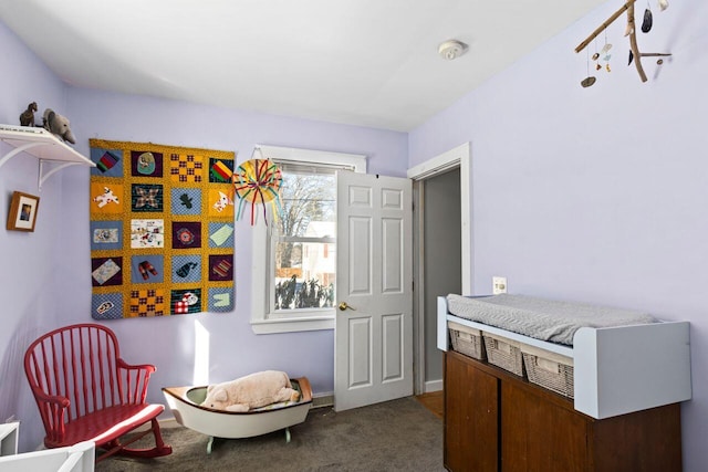 bedroom featuring dark colored carpet