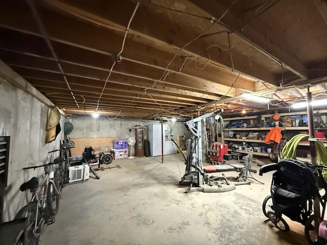 basement featuring refrigerator