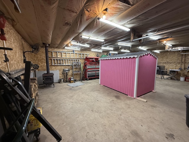 basement featuring a wood stove