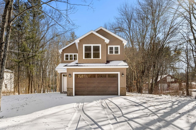 front facade with a garage