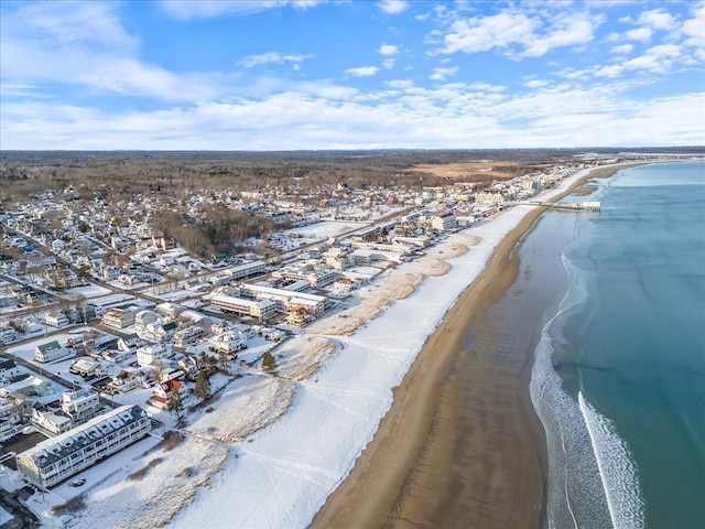 birds eye view of property featuring a view of the beach and a water view