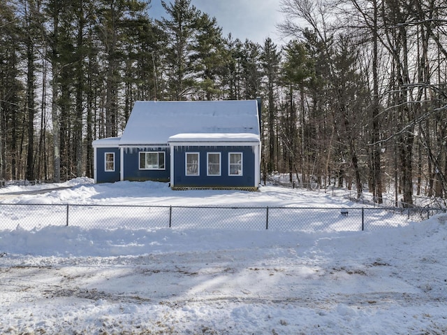 view of front of house with fence