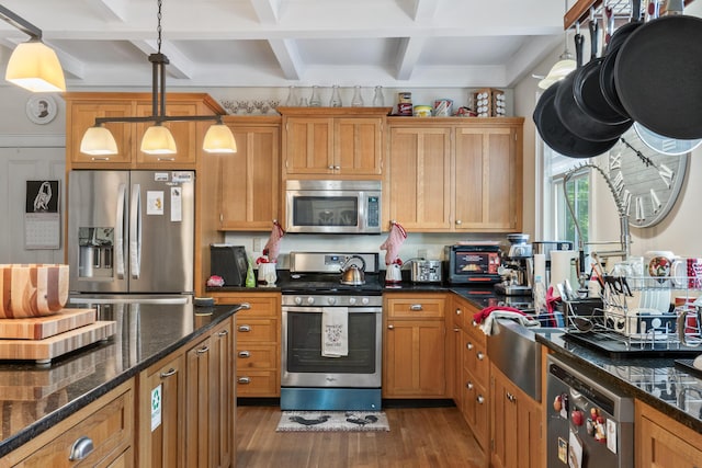 823 Washington St, Bath, ME 04530 - kitchen with dark wood-type flooring, appliances with stainless steel finishes, dark stone countertops, hanging light fixtures, and beamed ceiling