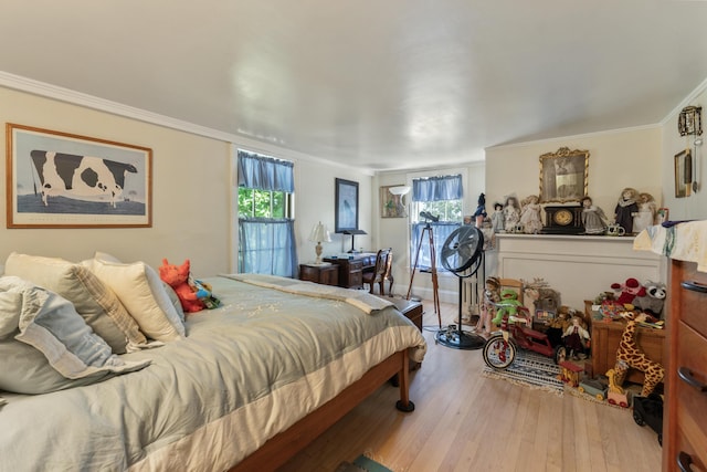 823 Washington St, Bath, ME 04530 - bedroom with ornamental molding and light hardwood / wood-style flooring