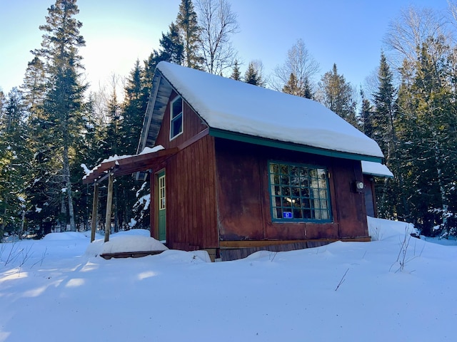 view of snow covered property