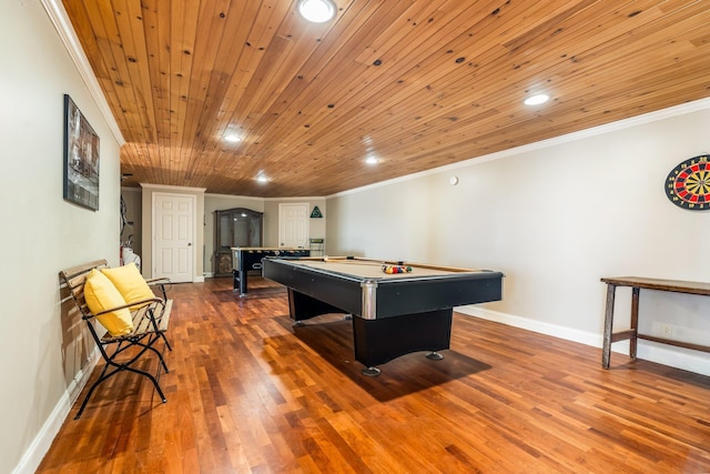 rec room featuring arched walkways, crown molding, wood finished floors, billiards, and baseboards