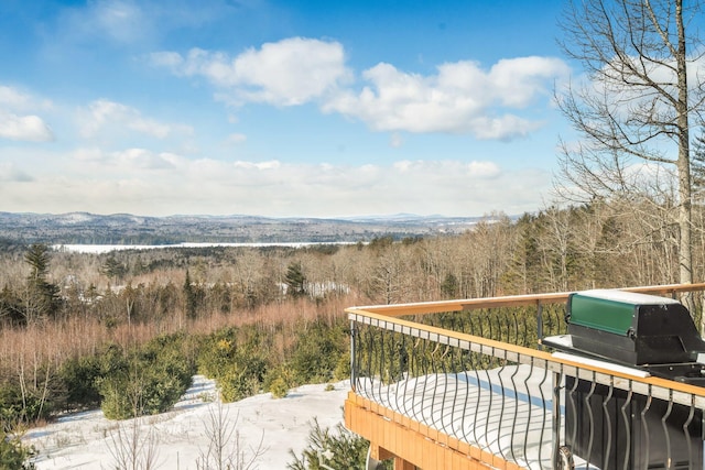 exterior space with a mountain view and a wooded view